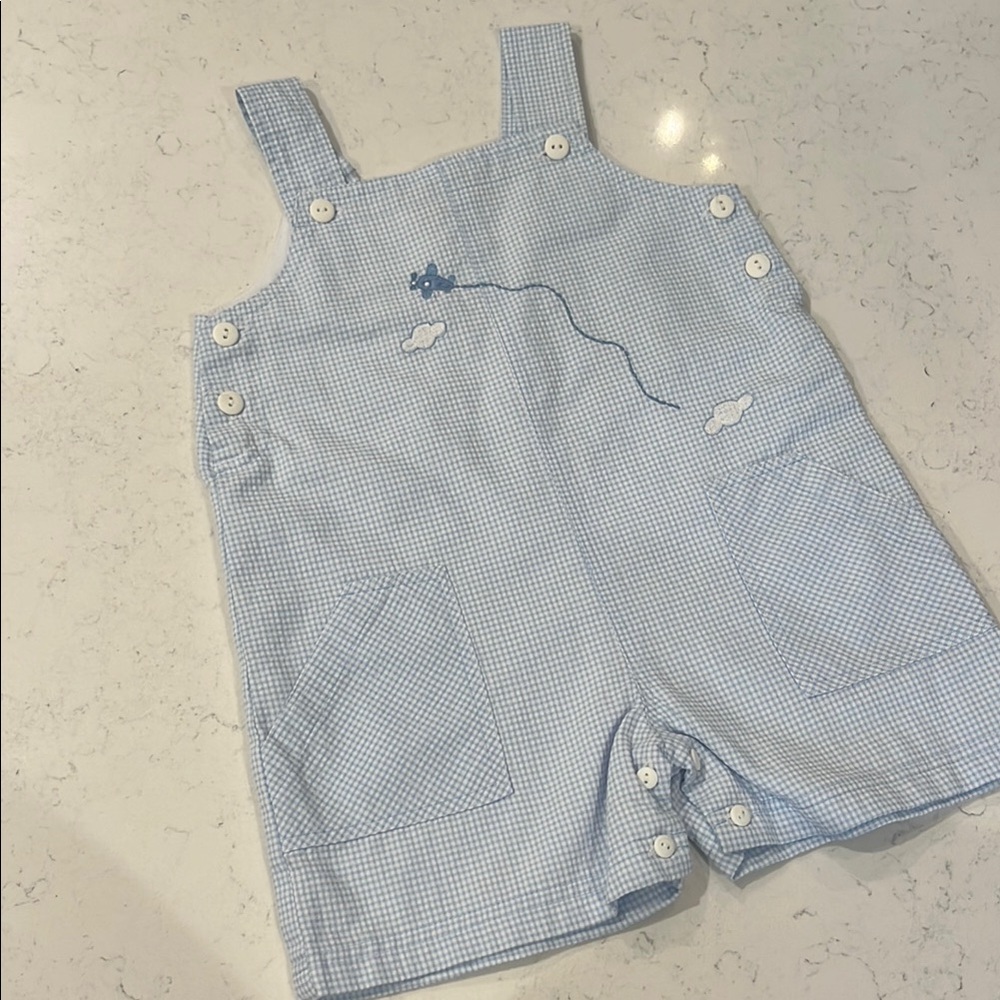 A Charleston Child Hand Embroidered Airplane Jon Jon.  Size 12-18M.